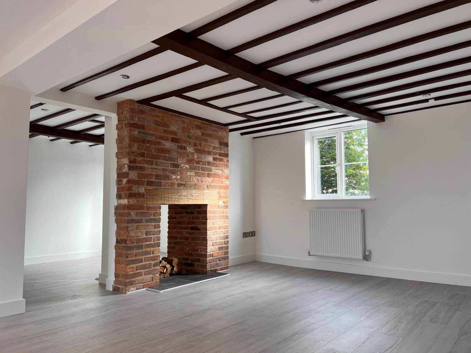 KOG Building Projects Ltd: Structural alterations in Lincolnshire & Nottinghamshire. New brick fireplace & exposed beams.